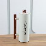 دلة مزخرفة بكتابة لون بيج